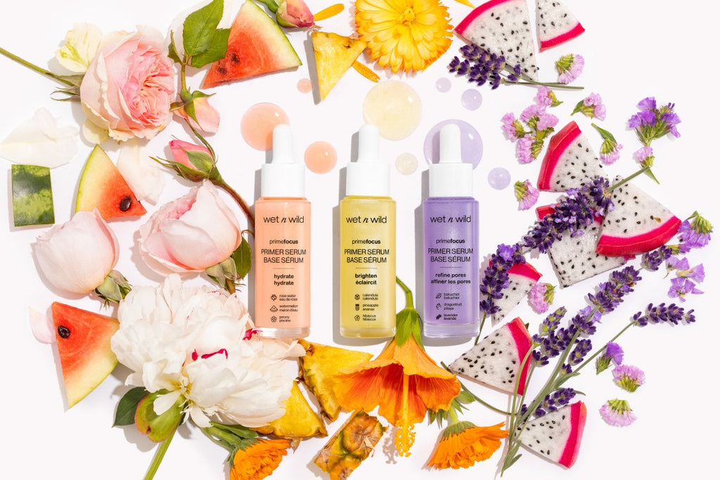 Wet n wild | Prime Focus Pore Minimizing Primer Serum | Product front facing lid closed, with floral background