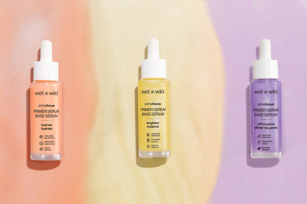 Wet n wild | Prime Focus Pore Minimizing Primer Serum | Product front facing lid closed, with colorful background