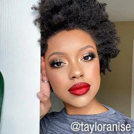 Woman with gold eyeshadow and bold red lipstick @tayloranise