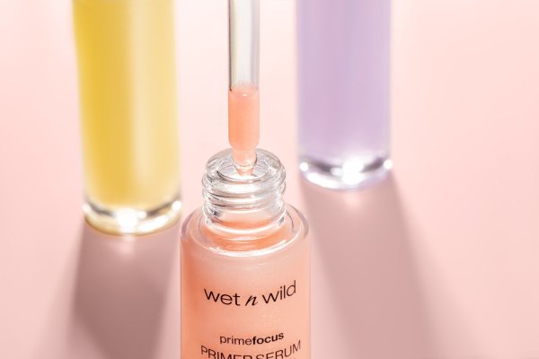 Wet n wild | Prime Focus Hydrating Primer Serum | Product front facing lid opened, with product swatch