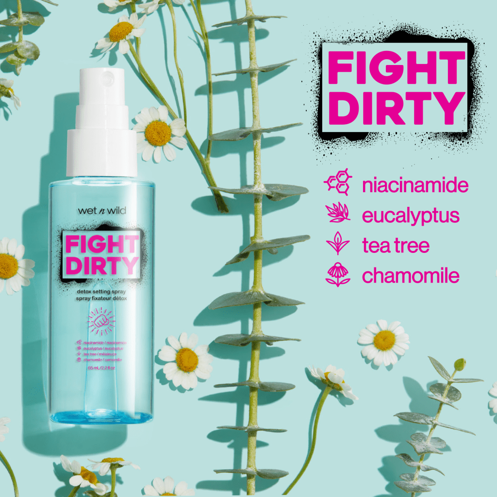 wet n wild | FIGHT DIRTY DETOX SETTING SPRAY | product with cap off, floral background