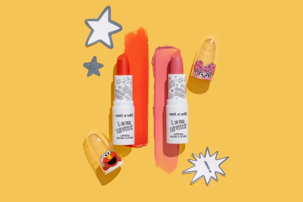 Wet n wild | L Is For Lipstick Lipstick- Giggles | Product front facing cap off, with colorful background