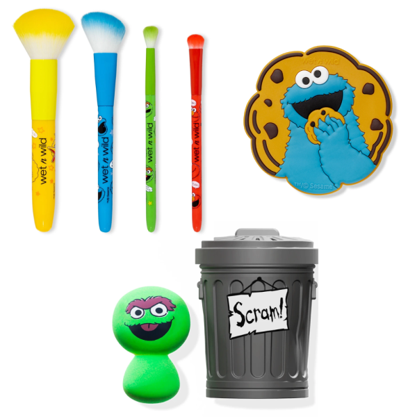 alt= " Sesame Street brush set, Cookie Monster Mirror, Oscar the Grouch sponge and trash can sponge holder"